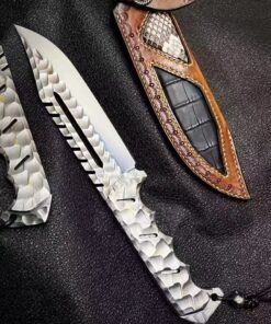 An all steel bowie bug out survival knife with its leather sheath.